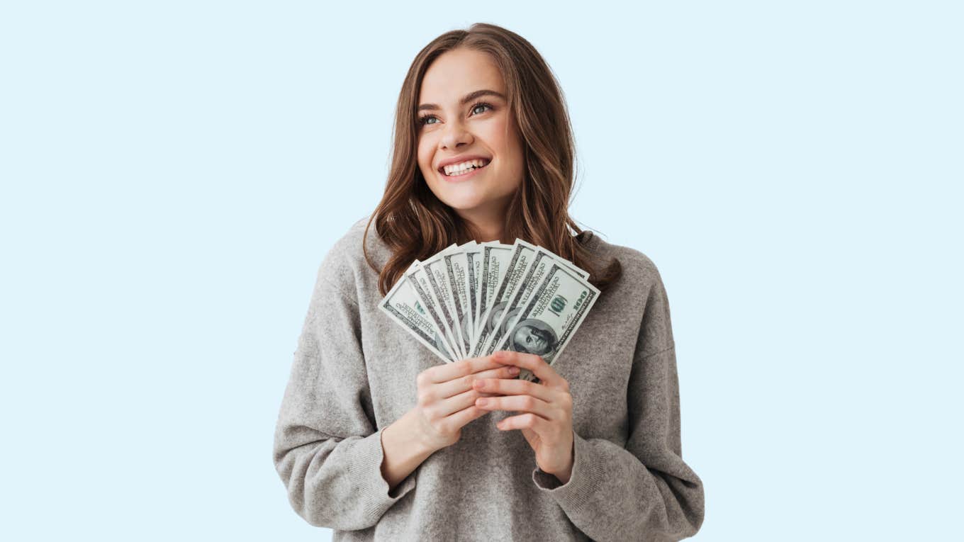 woman who follows money rules to attract financial abundance