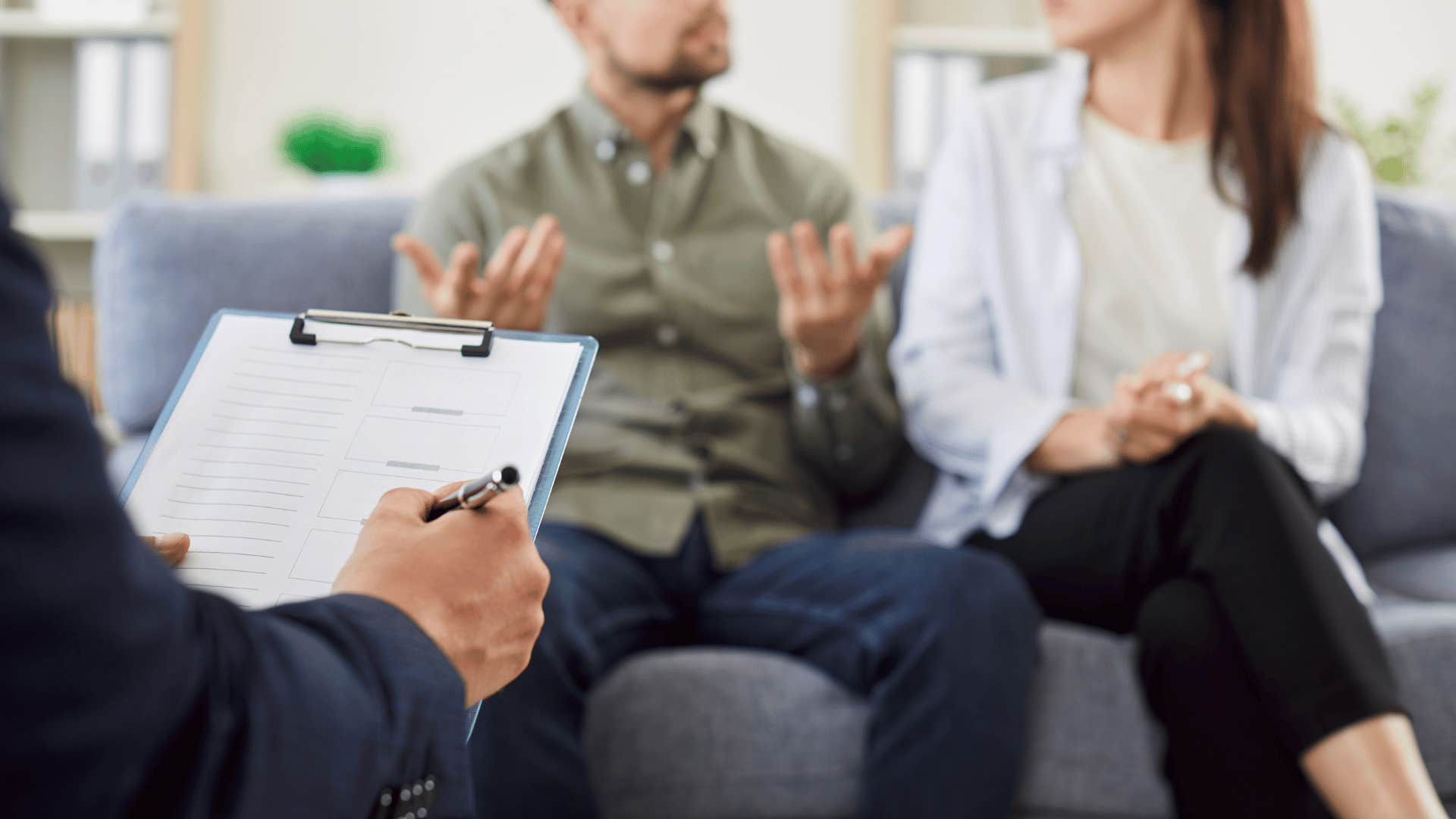 couple in therapy as woman complains about husband