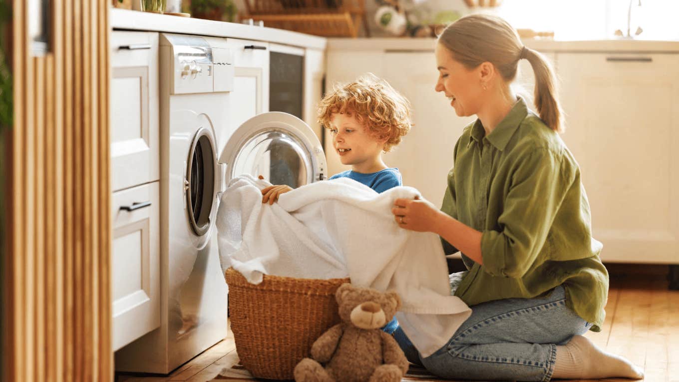 little boy doing chores at a young age