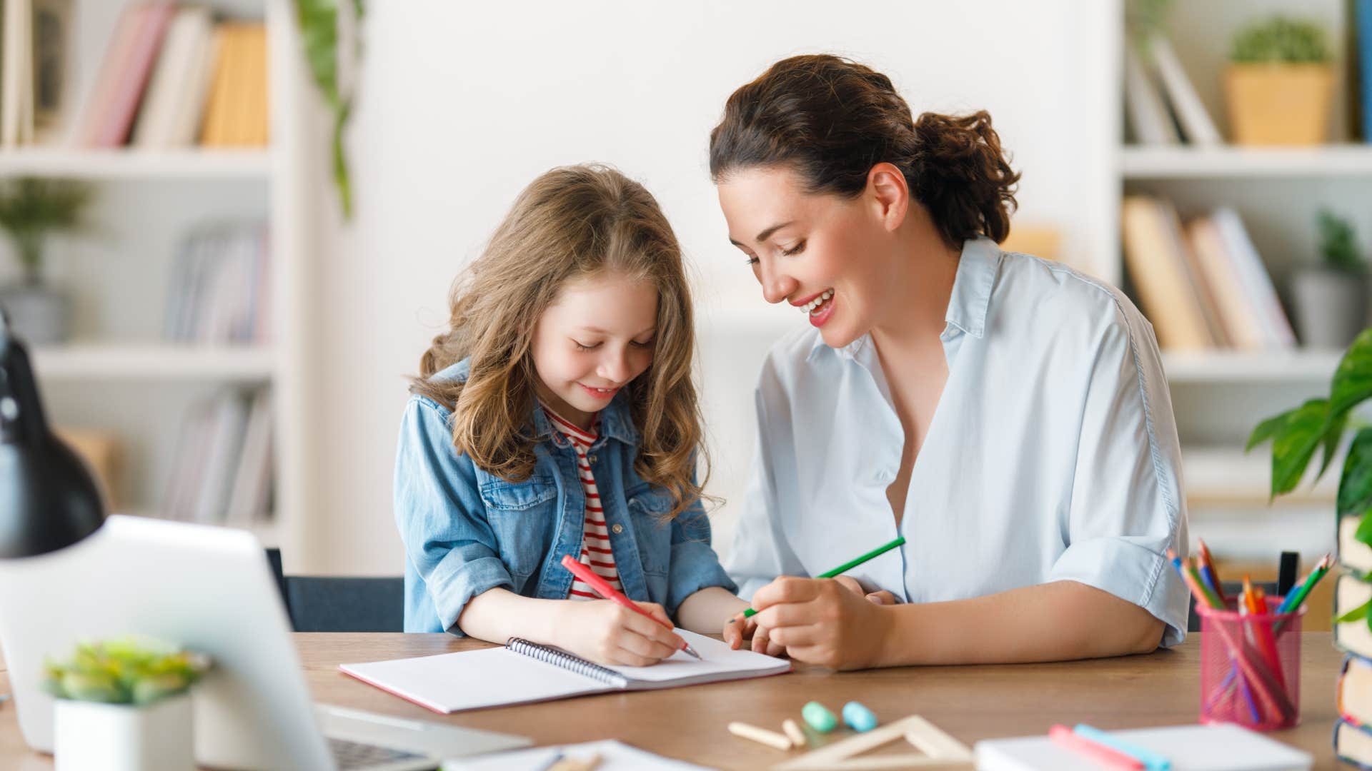 mom helping daughter do her homework right the first time