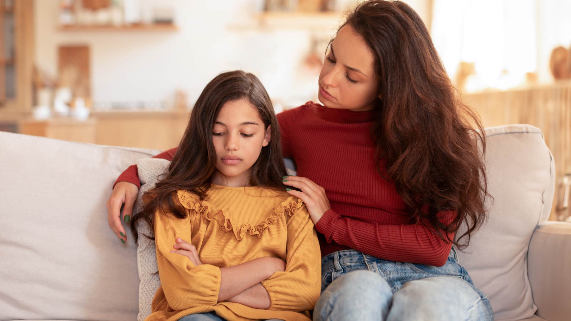 mom comforting daughter telling her not everyone will like you