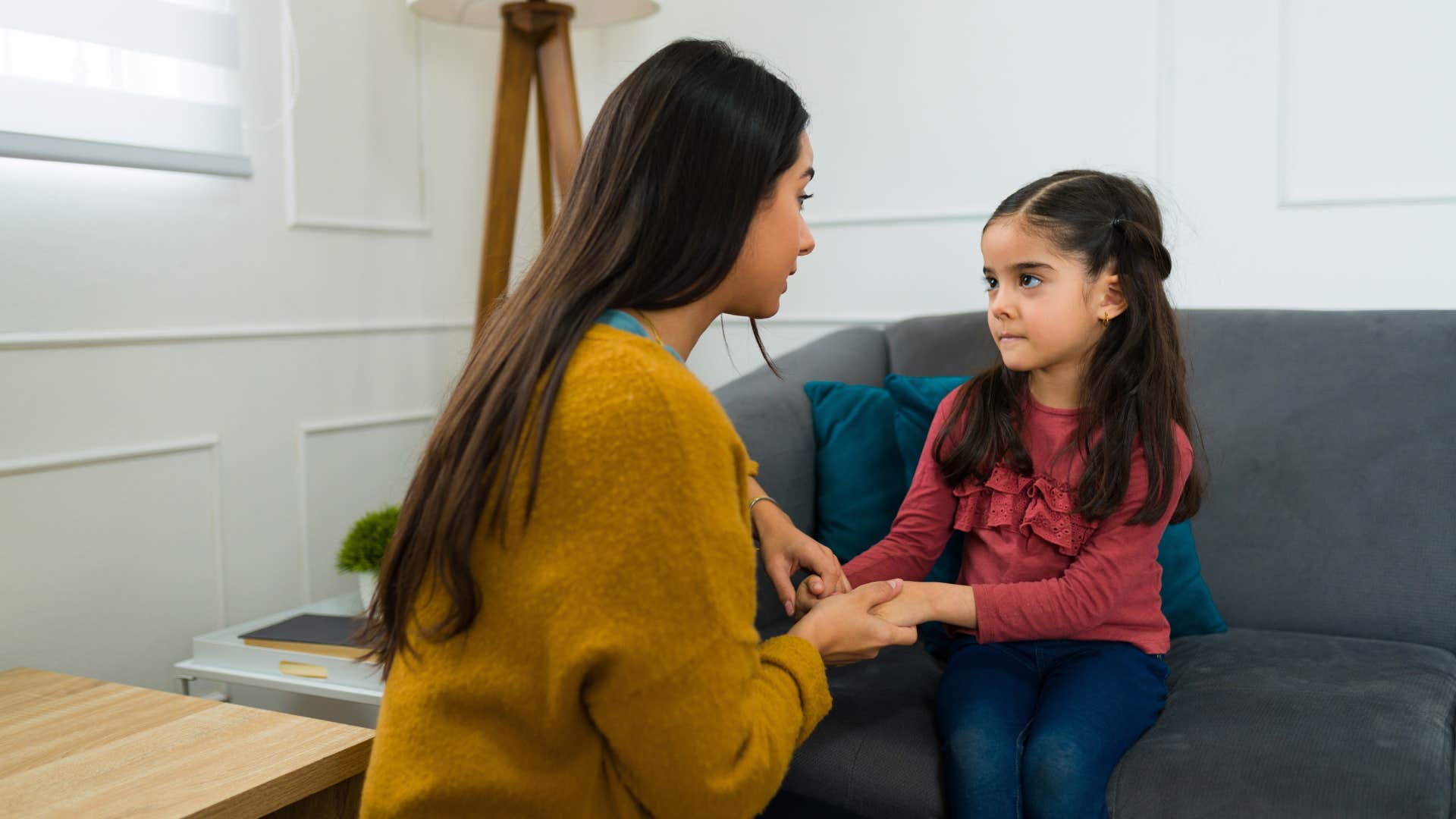 mom respectfully talking to daughter