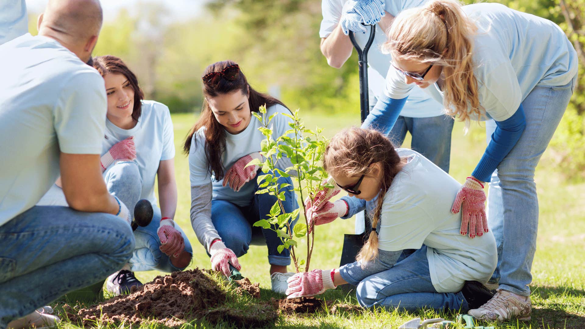 family planting a tree