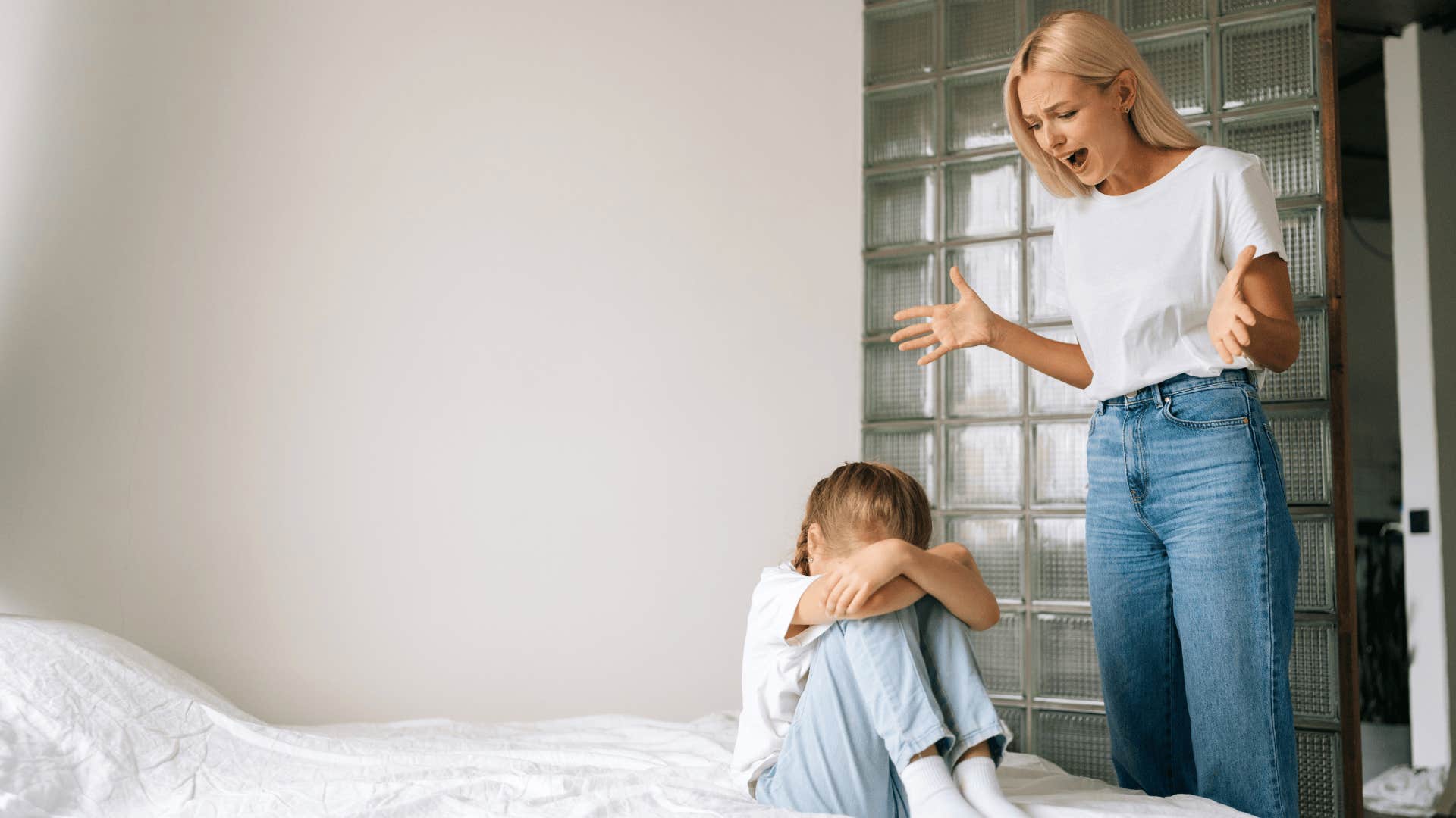 woman yelling at child raising mentally weak kid