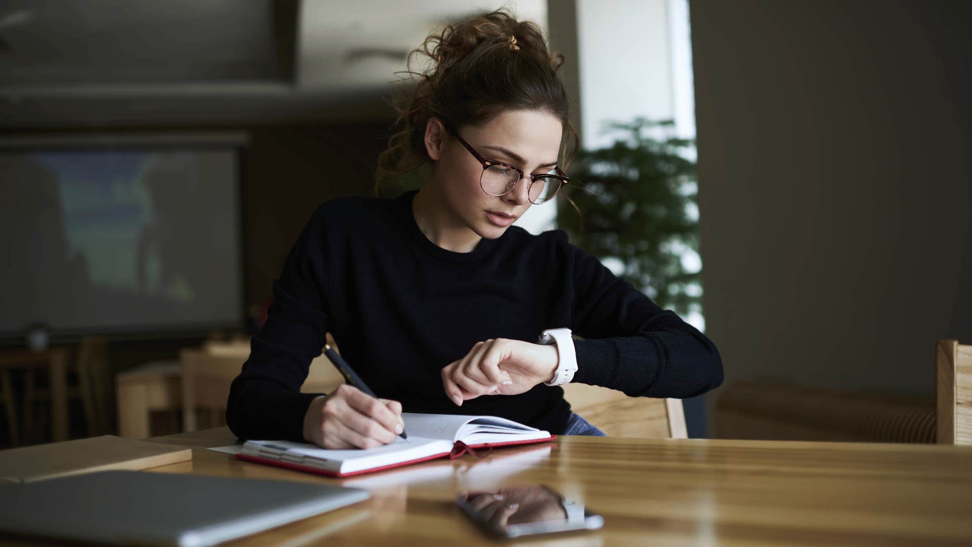 woman without friends working late into the night