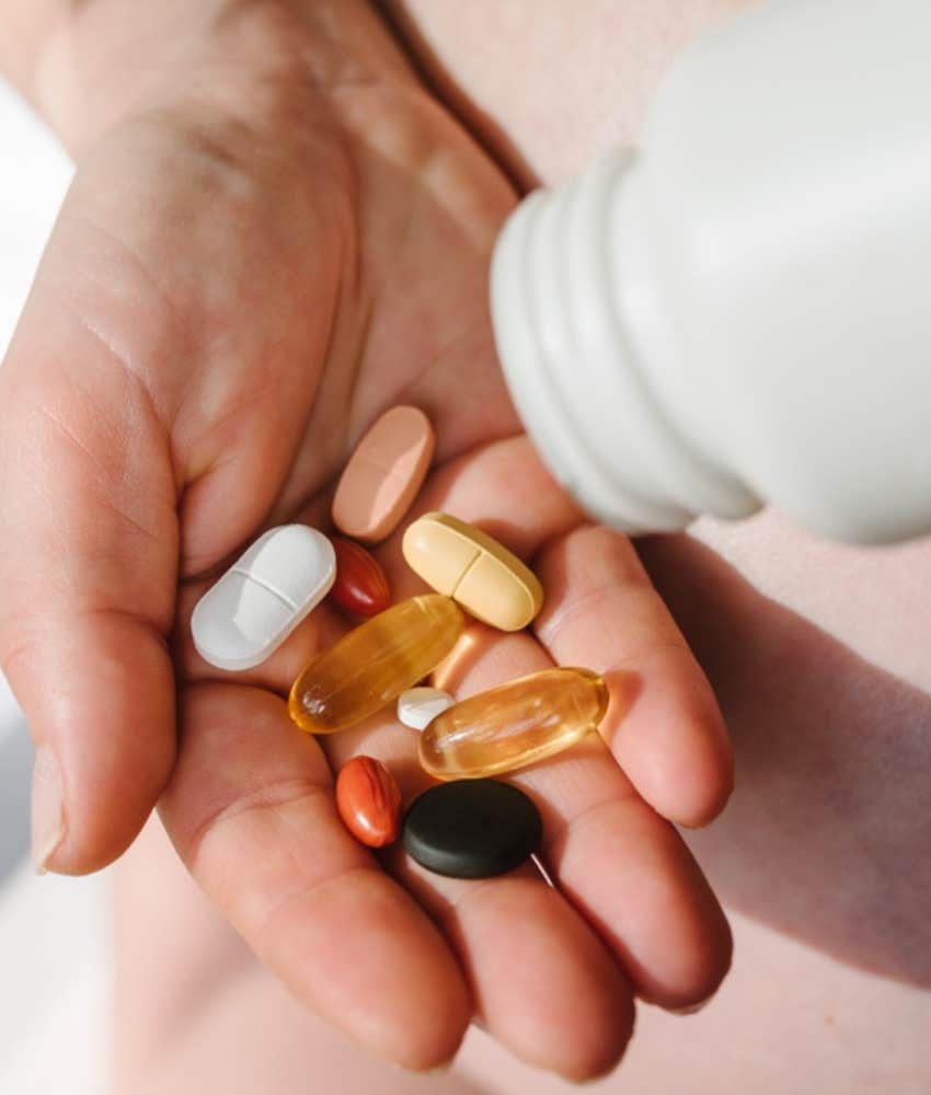 person taking supplements 