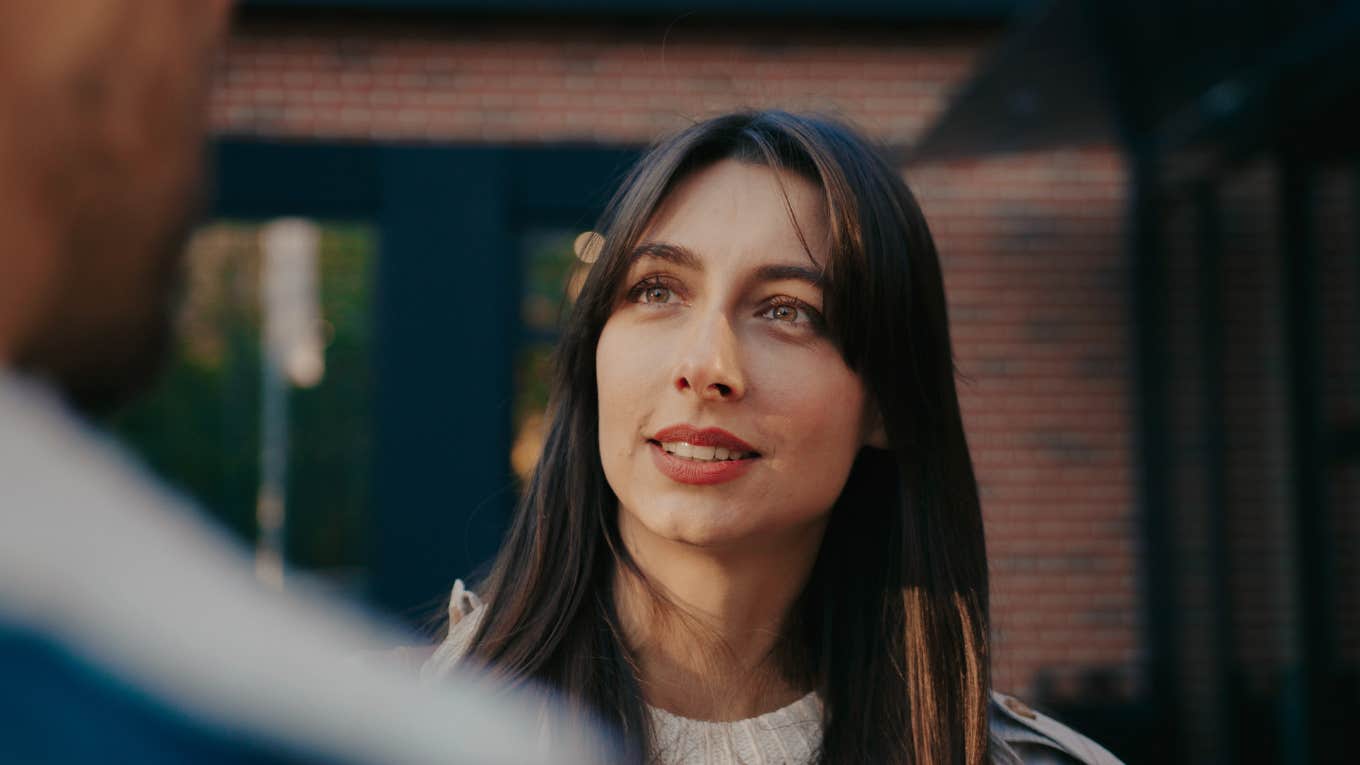 annoyed woman politely ending dramatic conversation
