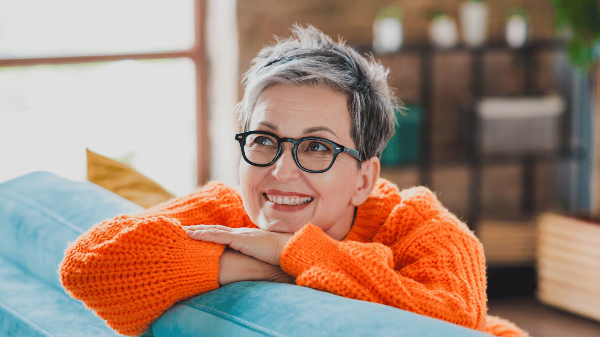happy woman thinking about her goals