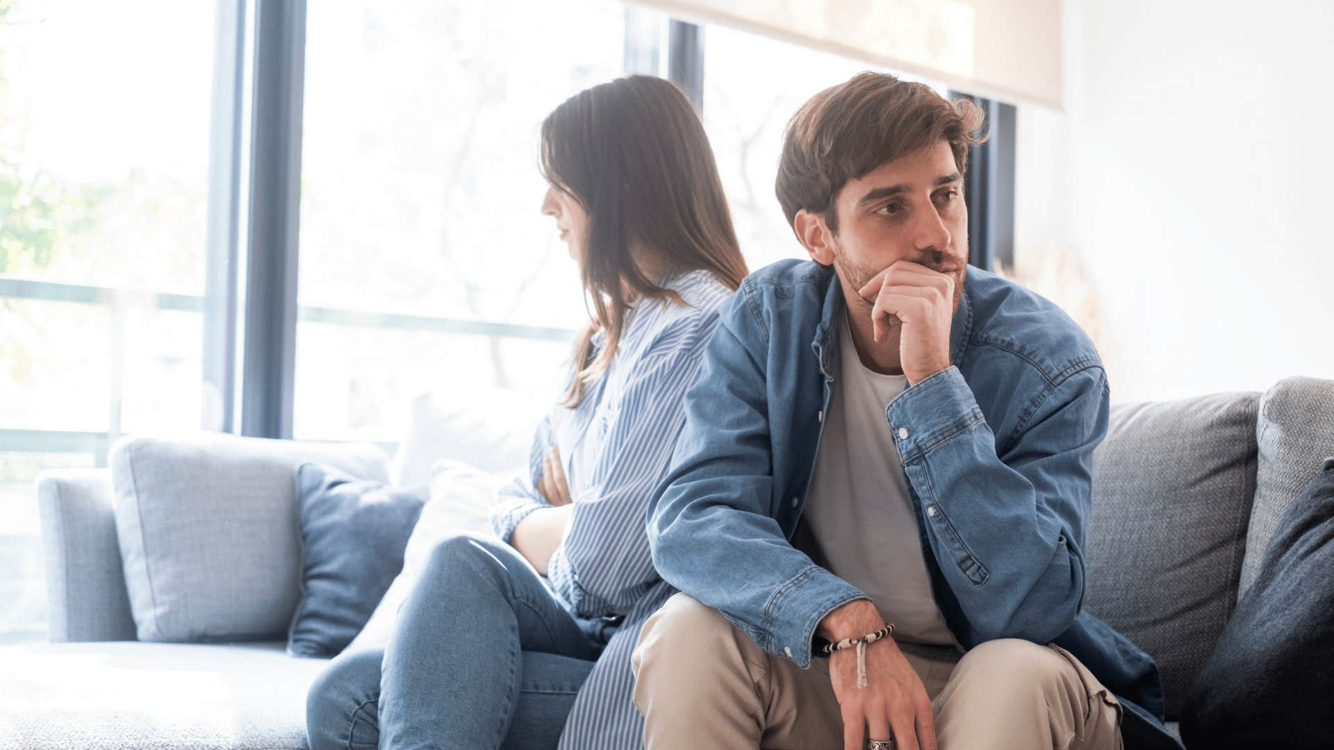 man turned away from narcissistic woman
