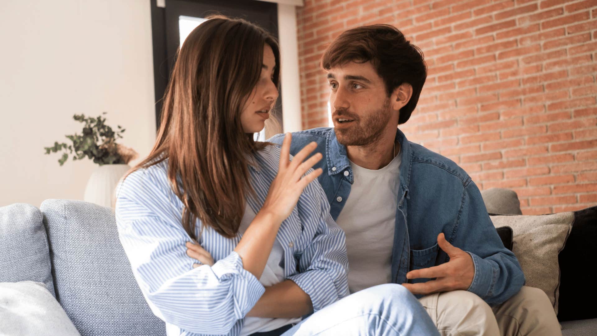 sensitive woman telling man to stop talking to her