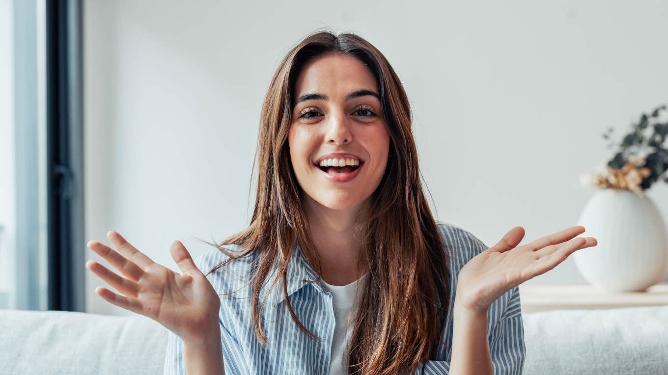 Phrases Highly Respected People Never Say In Conversations respected woman smiling with hand gestures