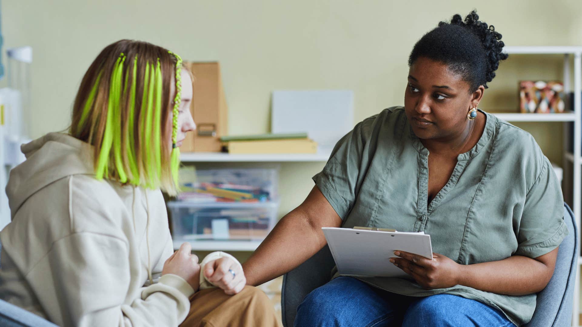 teen girl talking to school psychologist
