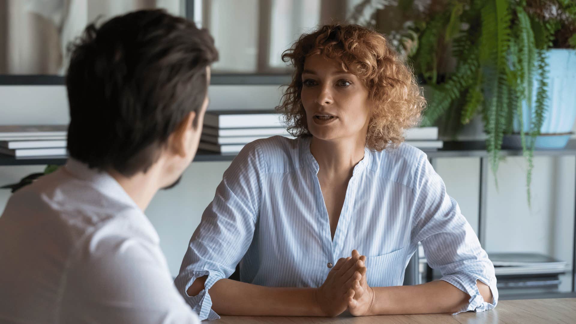 woman talking to man