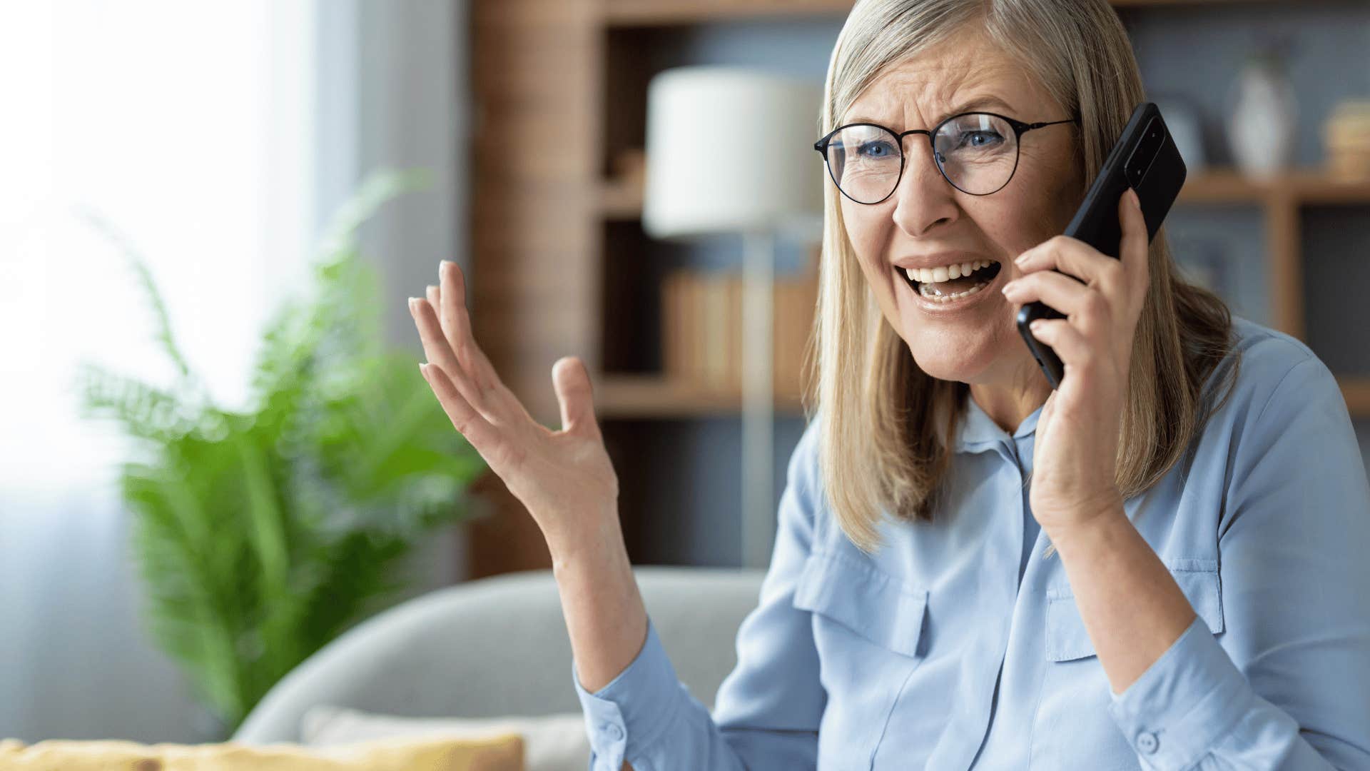 woman angrily talking on phone