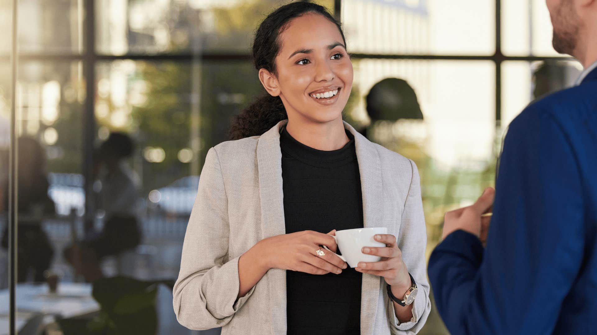 professional woman talking to colleague