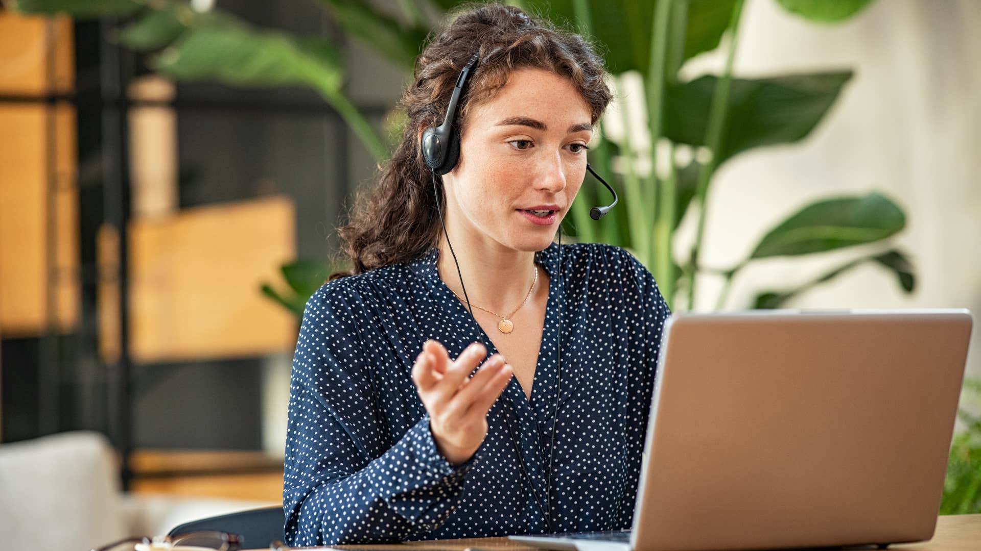 young professional woman on a headset