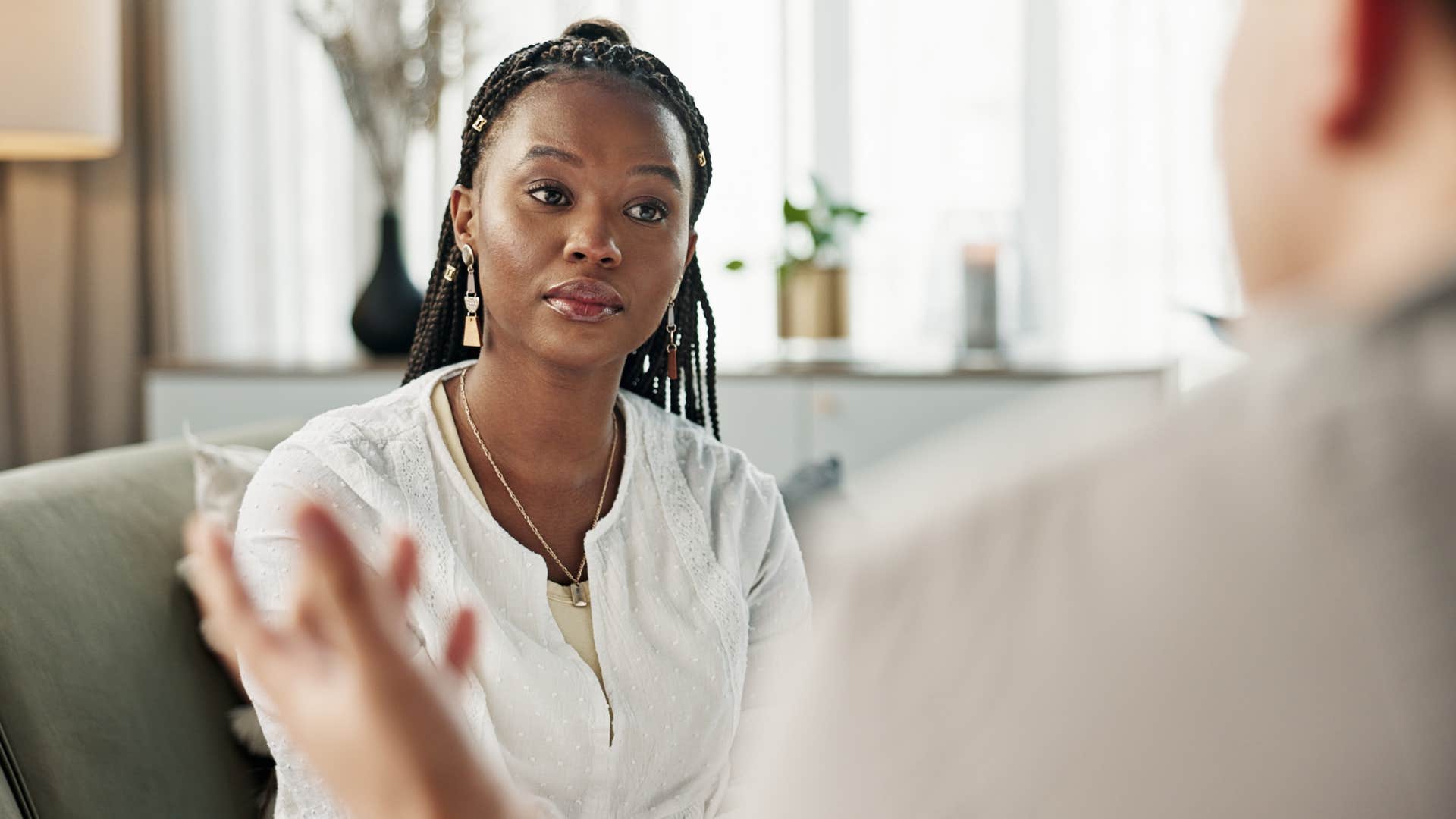 professional woman looking at man across from her
