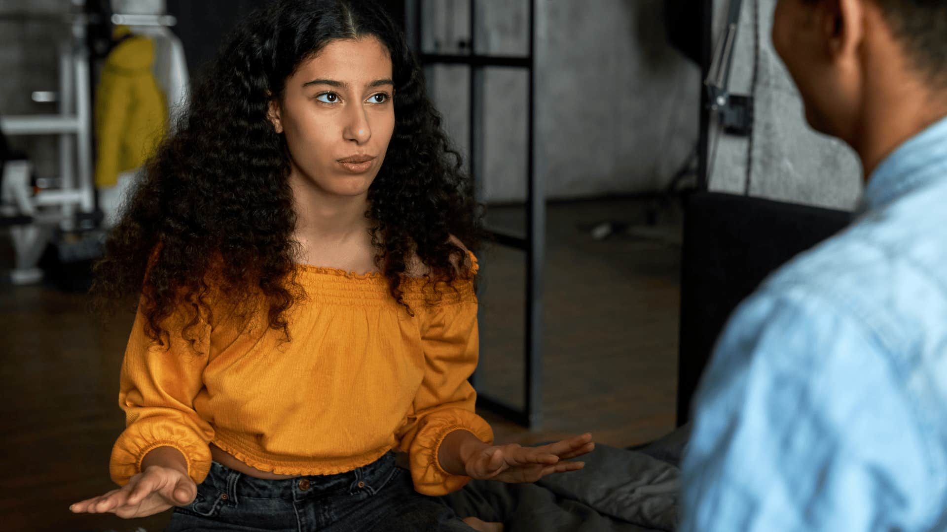 woman setting boundaries in tense conversation