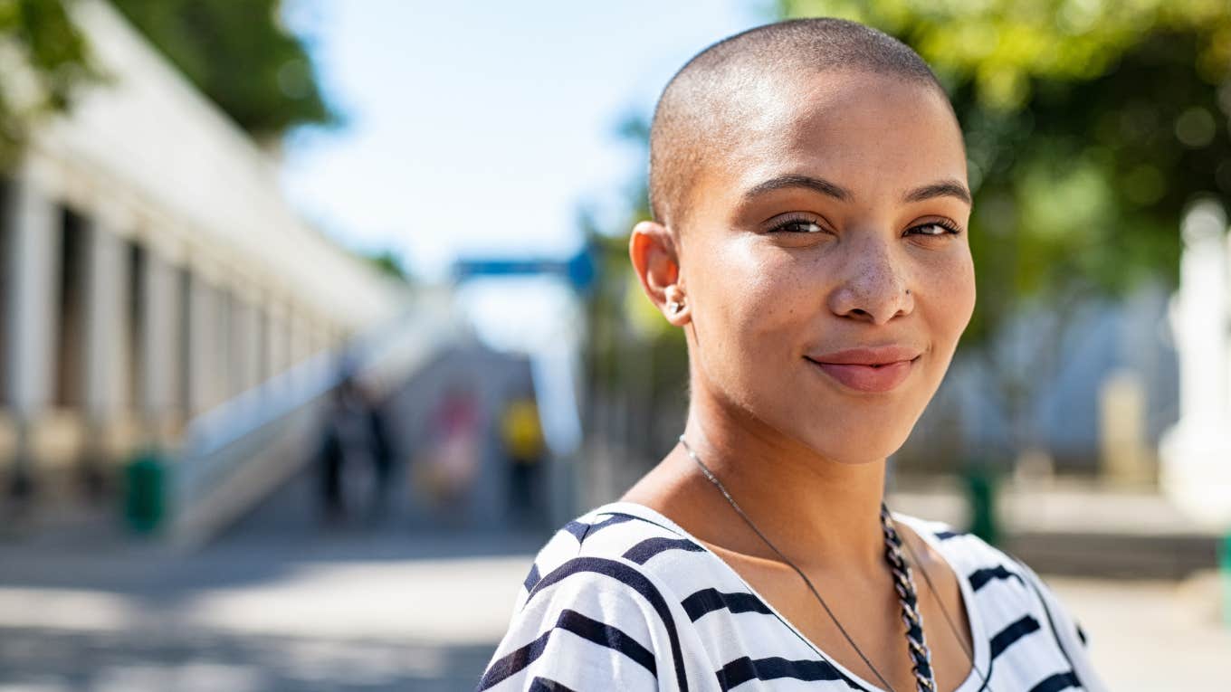 Phrases Winners Use That Losers Just Don't Get happy smiling woman acting like a winner