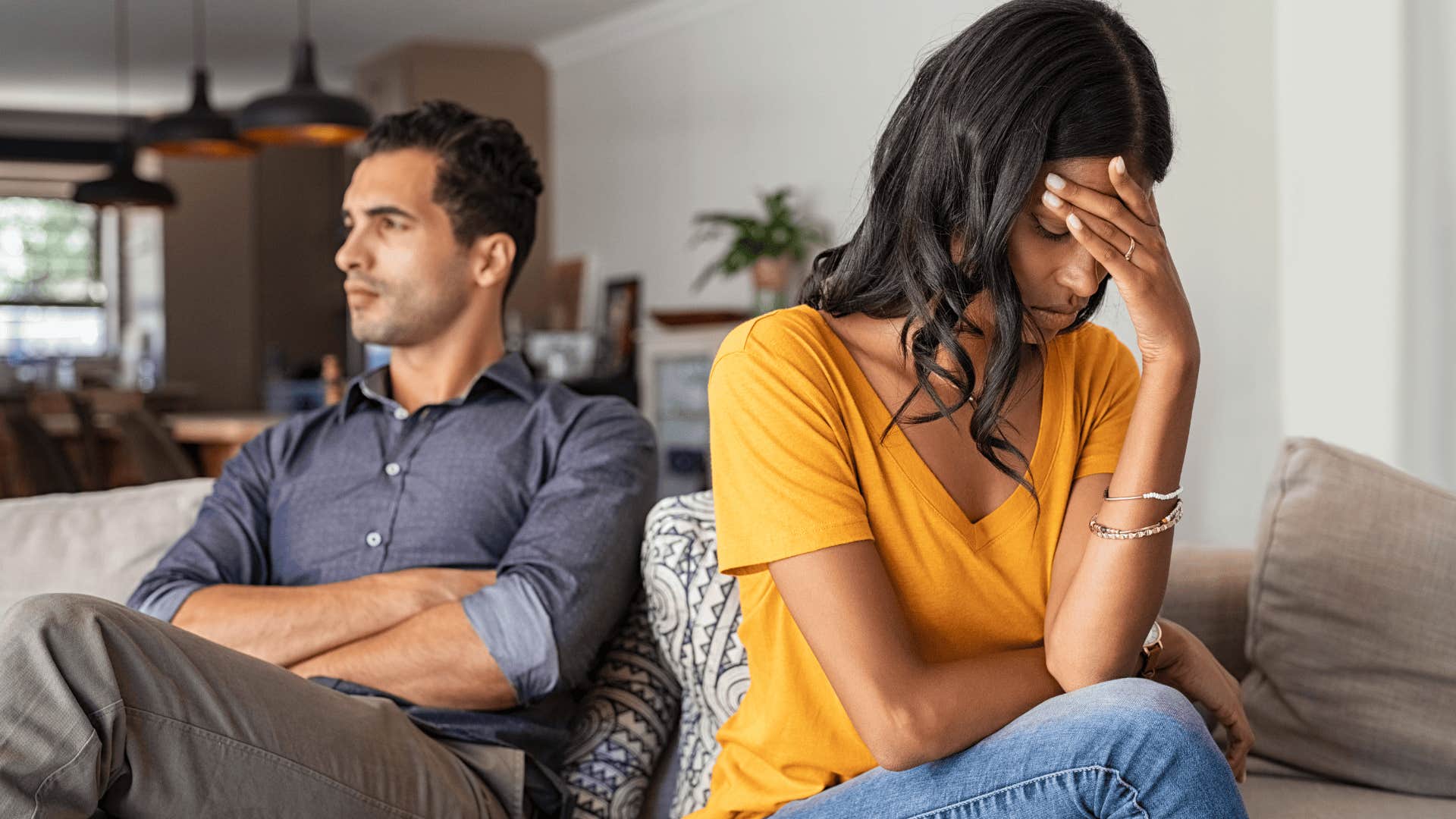 fed up woman turned away from her partner