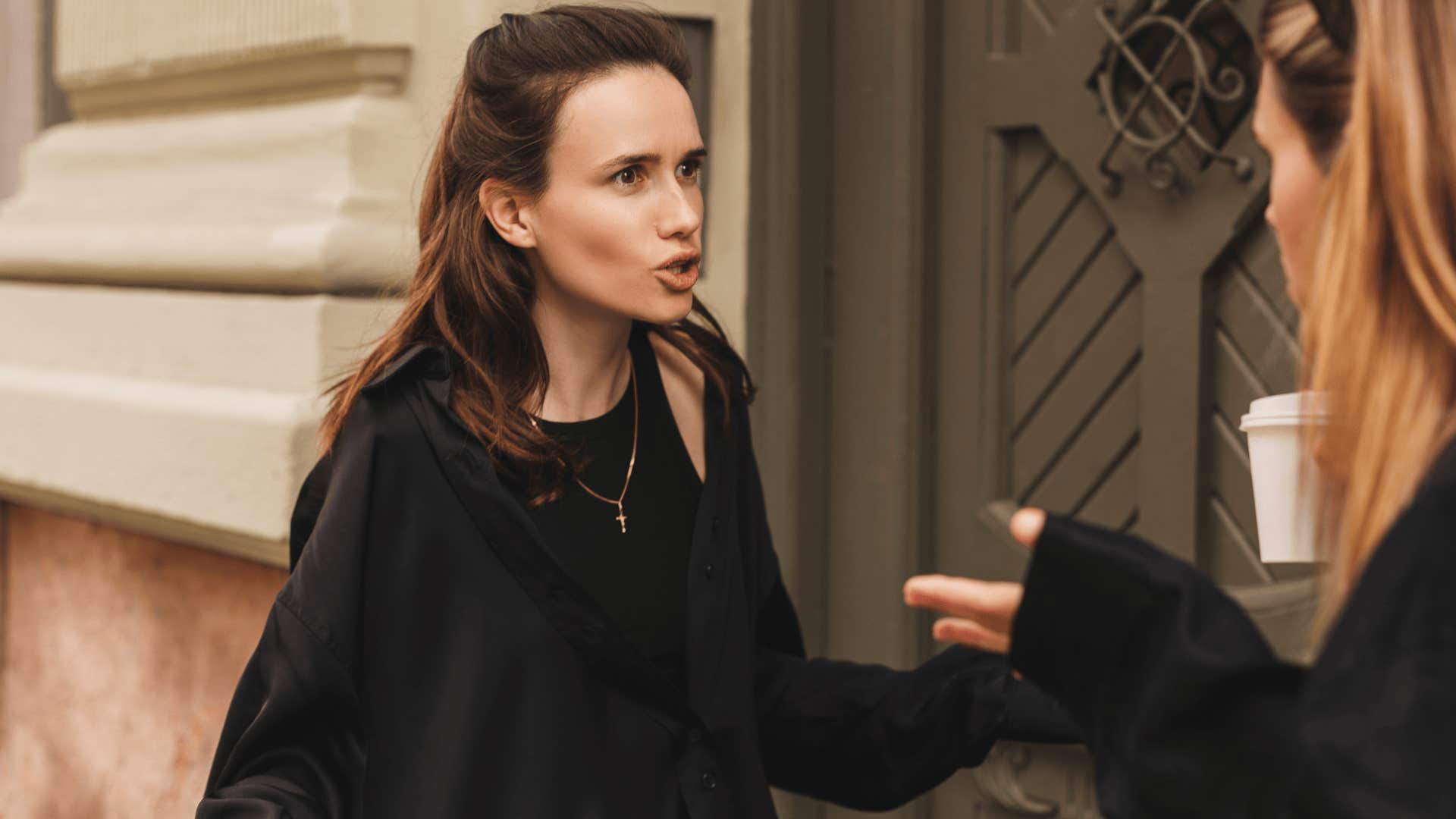 angry woman arguing with friend