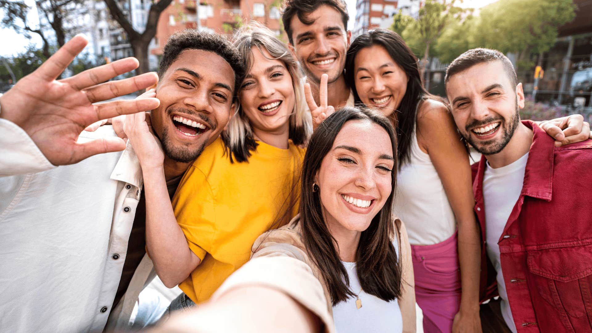smiling woman with friends that make her unforgettable