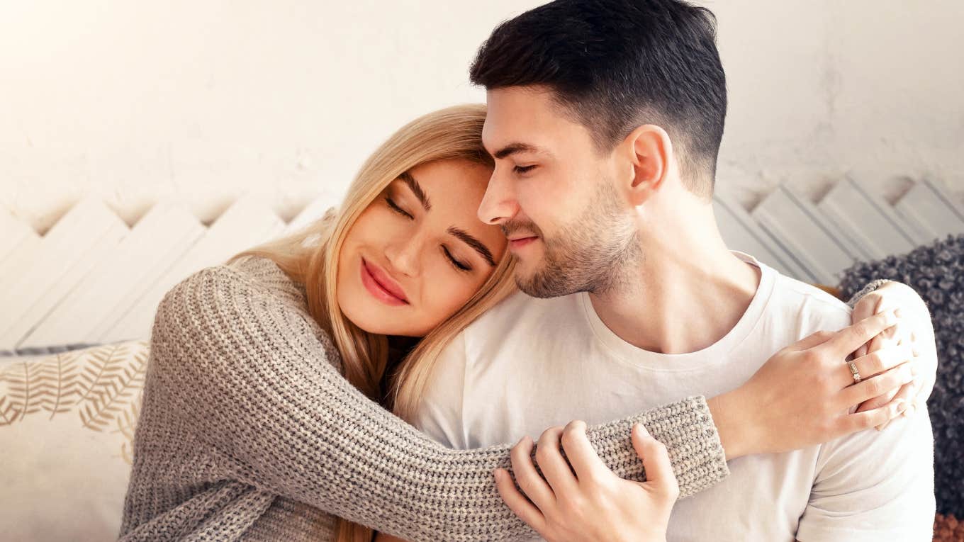 The Relatable Trauma Someone’s Preferred Love Language Reveals About Them Couple realizing their love languages reflect their childhood trauma
