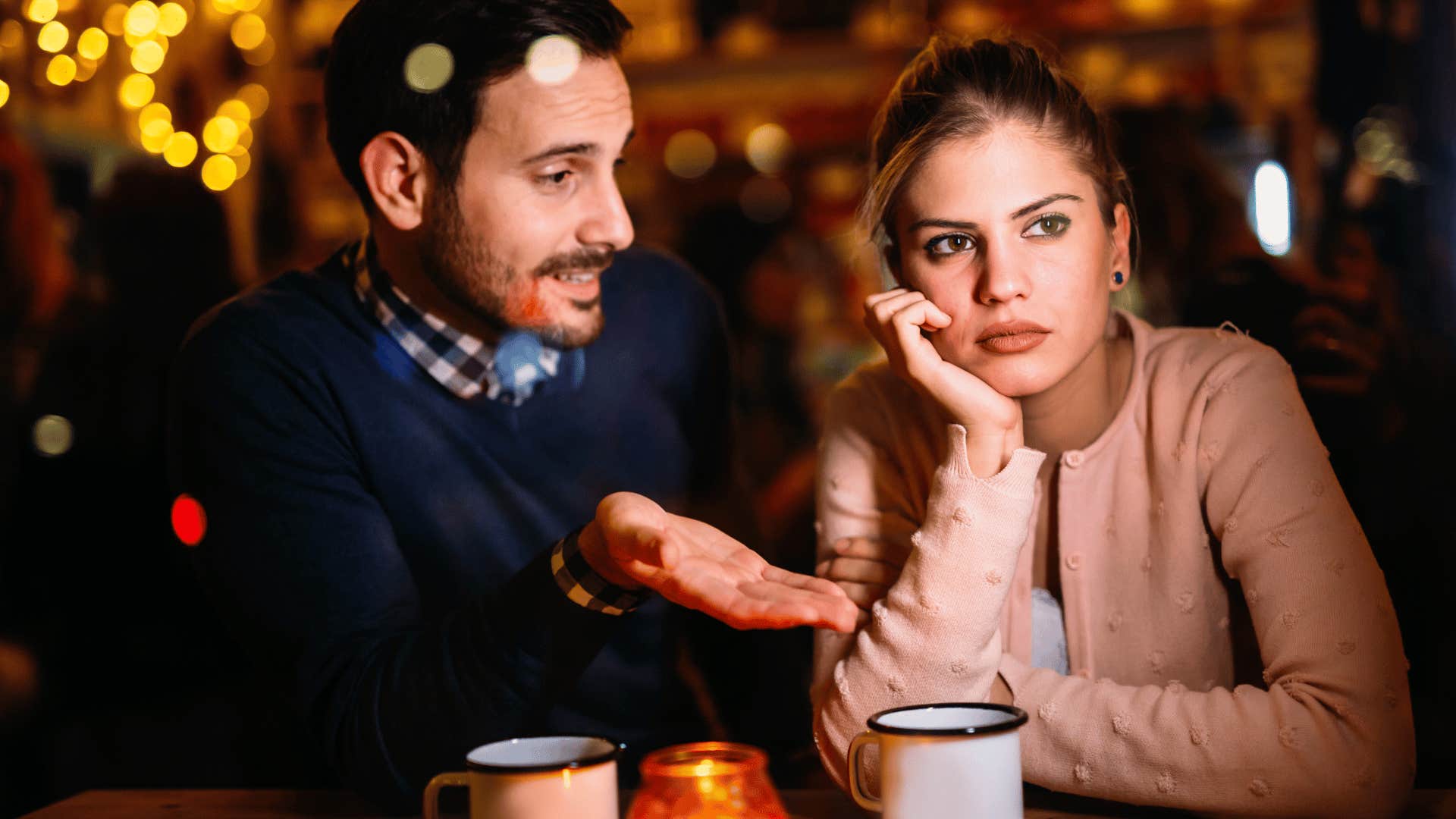 Bored woman is tired of hearing untrusting man bring up past mistakes