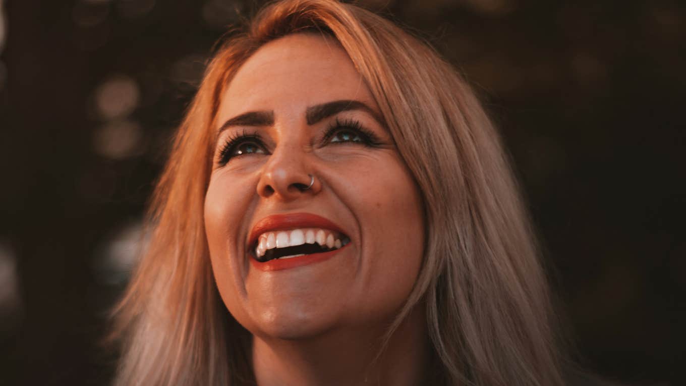 Low-Key Secrets Happy Couples Are Keeping From The Rest Of Us, According To Psychologist Woman is in a happy couple.