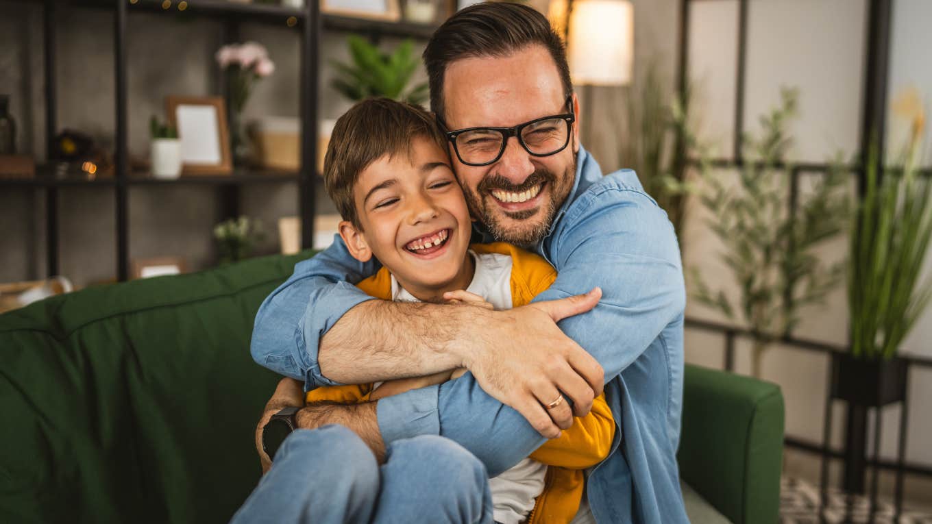 Sentimental Traditions That Keep Families Bonded For Life dad hugging young son smiling