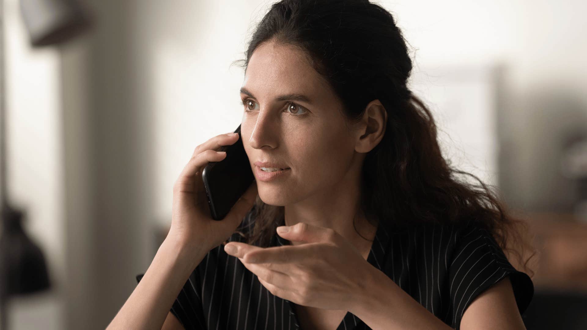 adult woman arguing on the phone