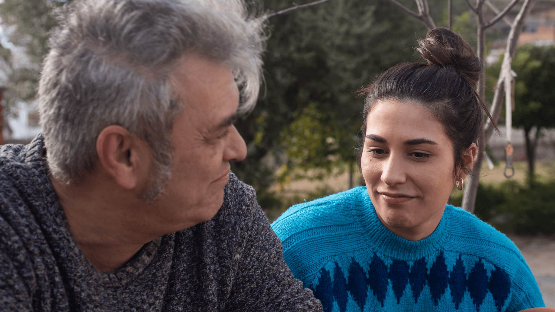 woman having a serious conversation with her dad