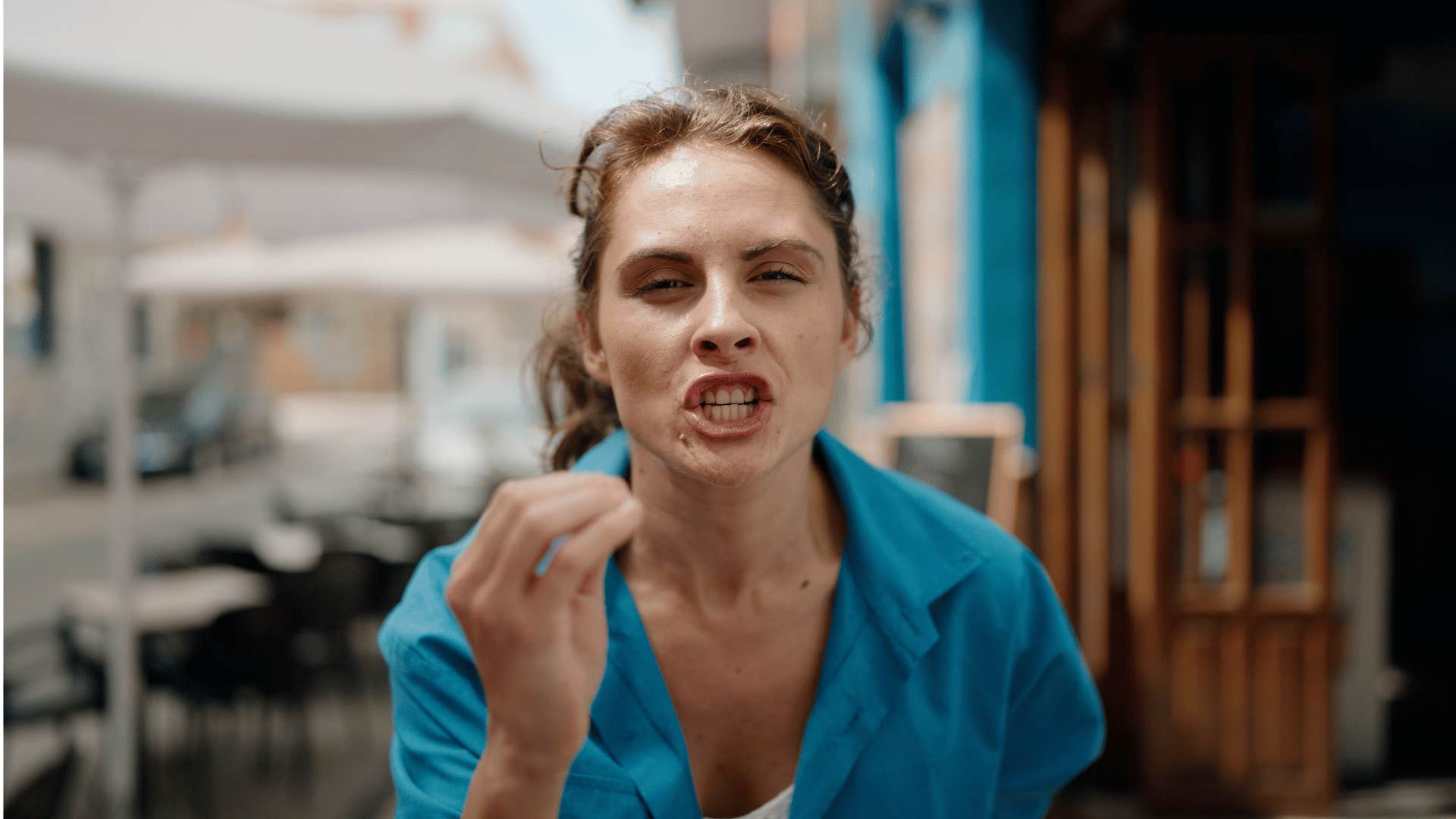 woman yelling in street