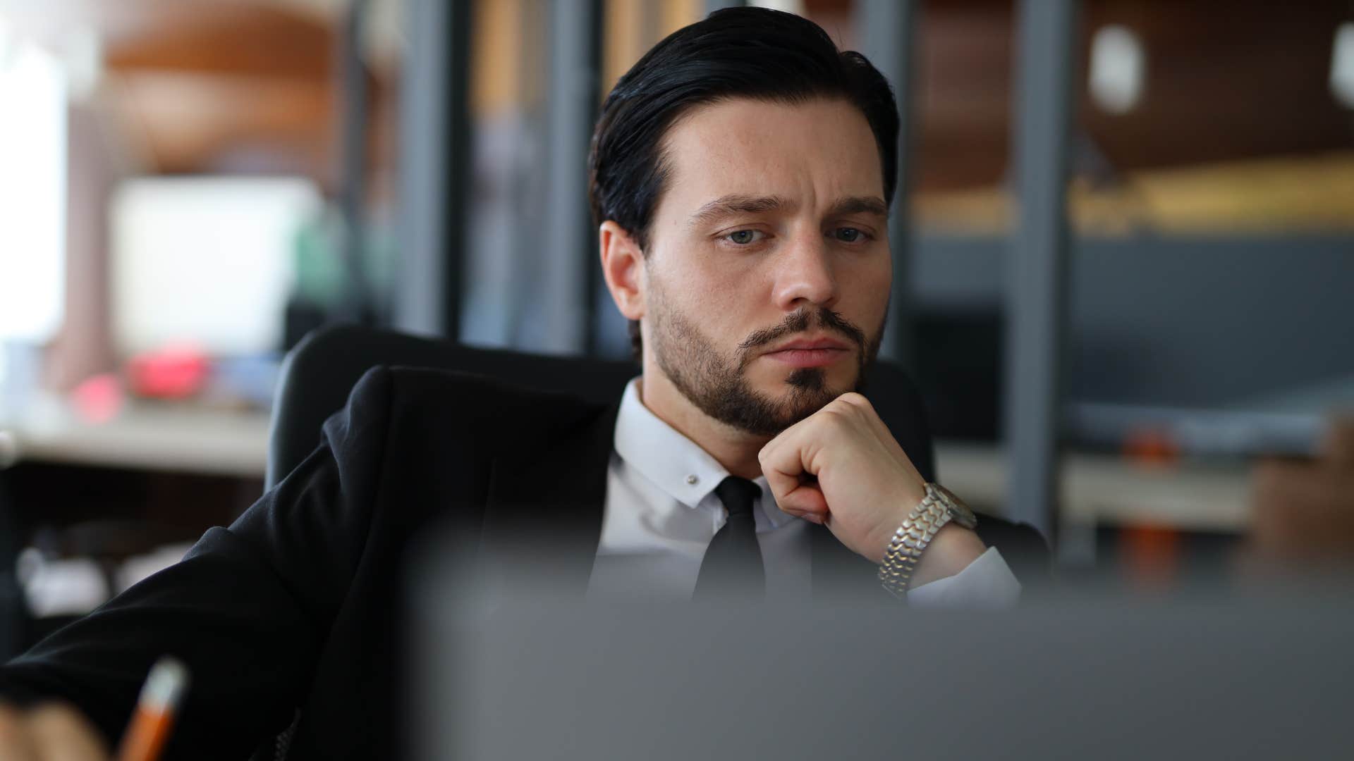 hyper-independent man is emotionally exhausted but pretending to be ok