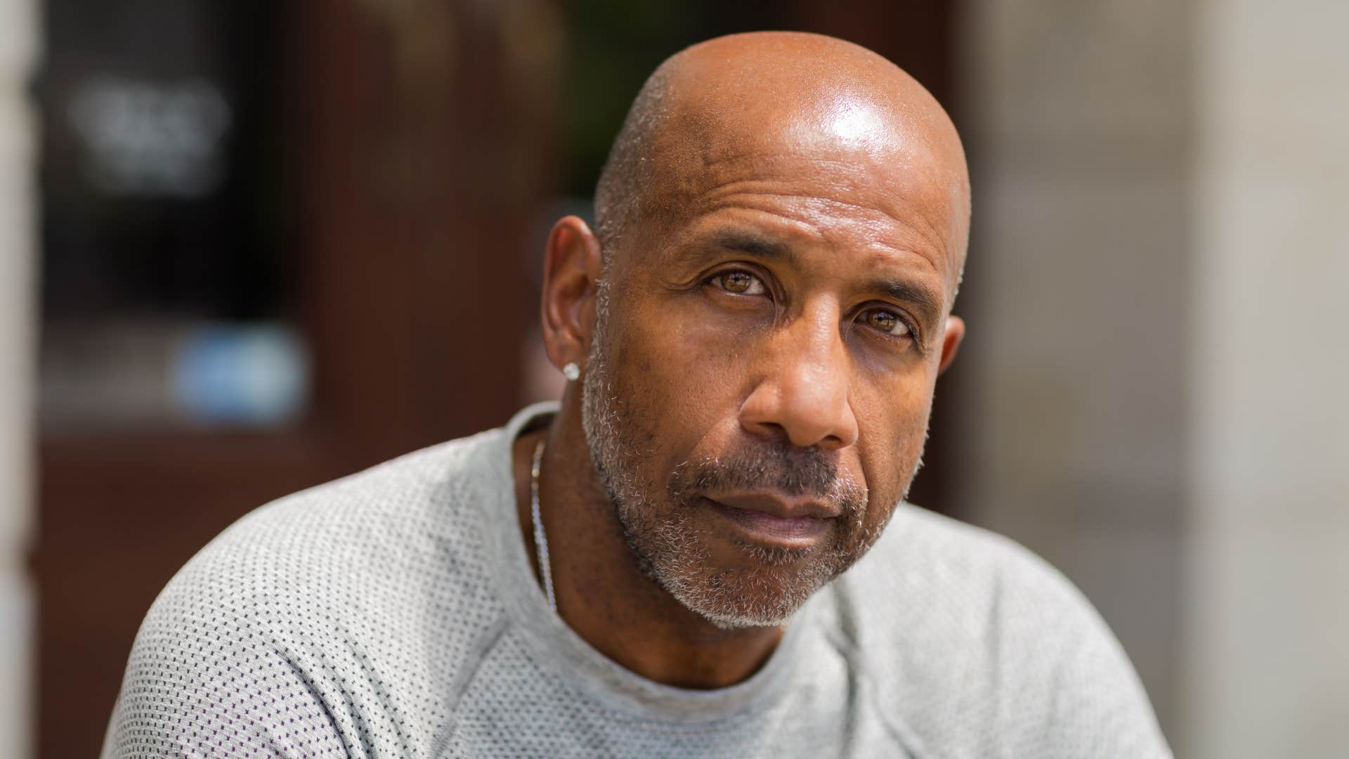 man stops being affectionate because he's emotionally exhausted but pretending to be ok