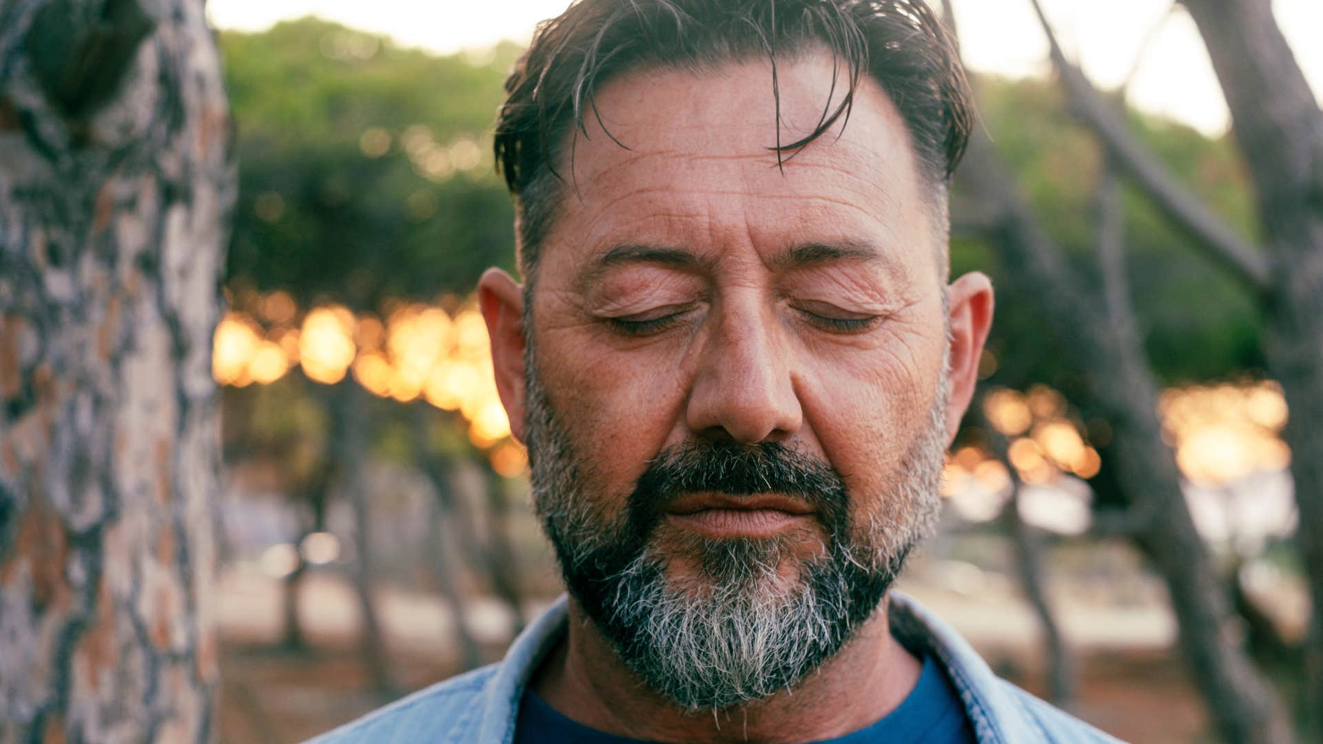man uses humor as a defense mechanism because he's emotionally exhausted but pretending to be ok