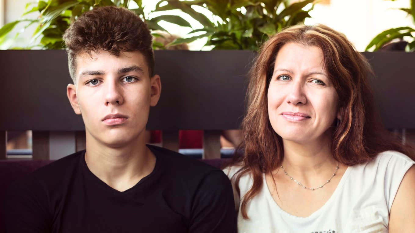 signs a man's narcissistic mom still controls him man sitting next to his narcissistic mother