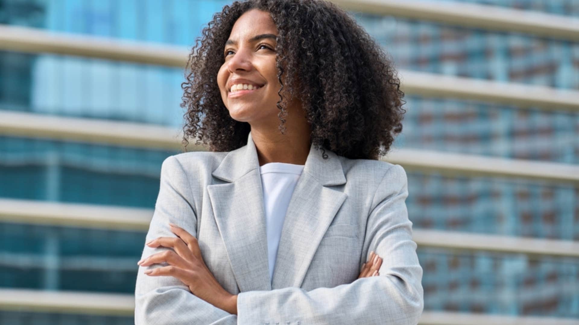 independent woman with her arms crossed