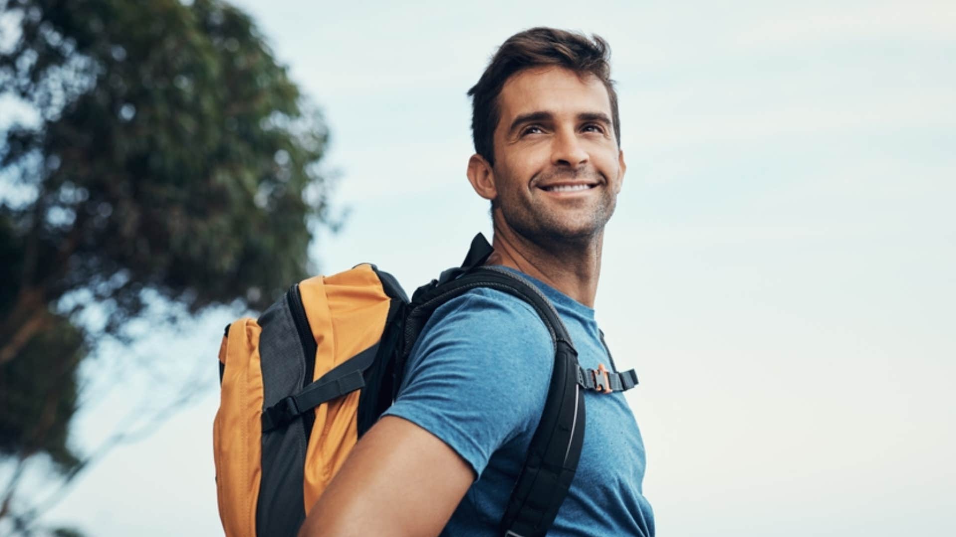 smiling man hiking