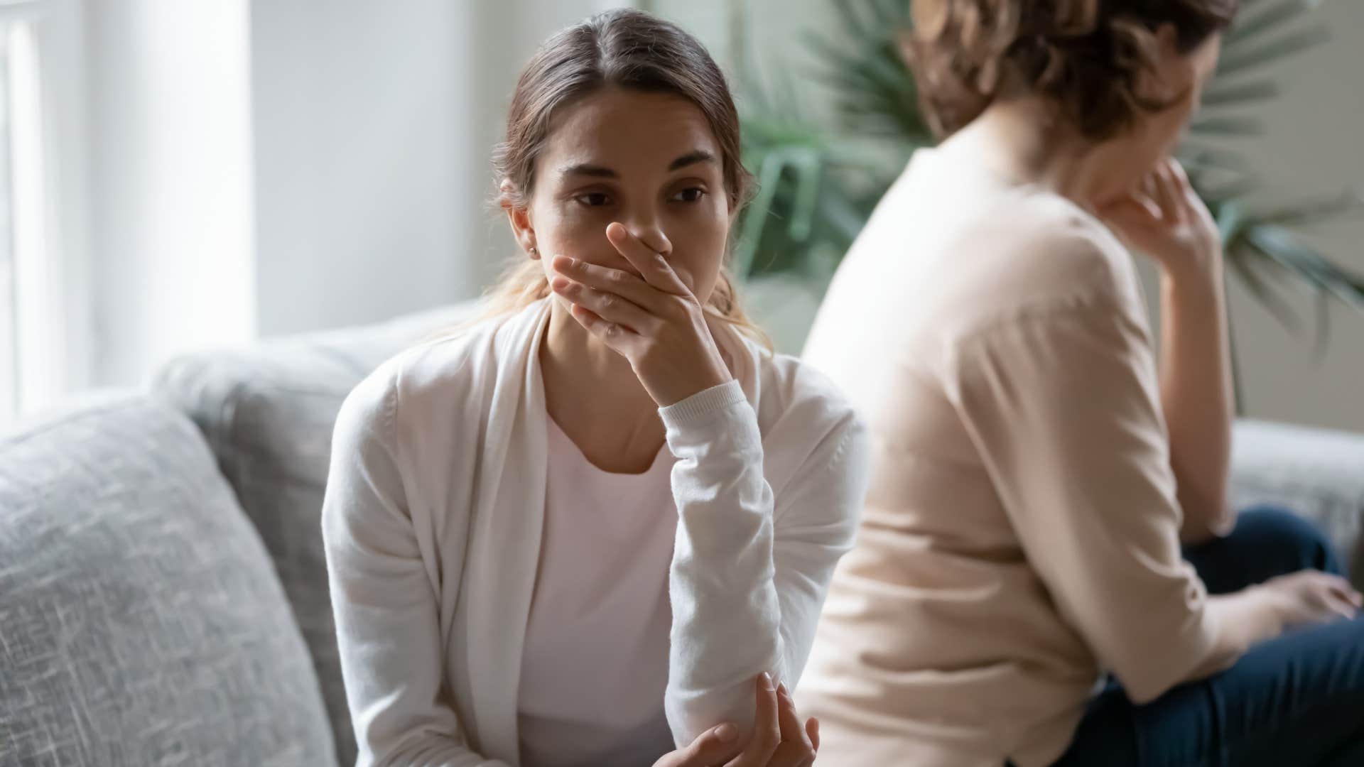 upset woman turned away from her mother