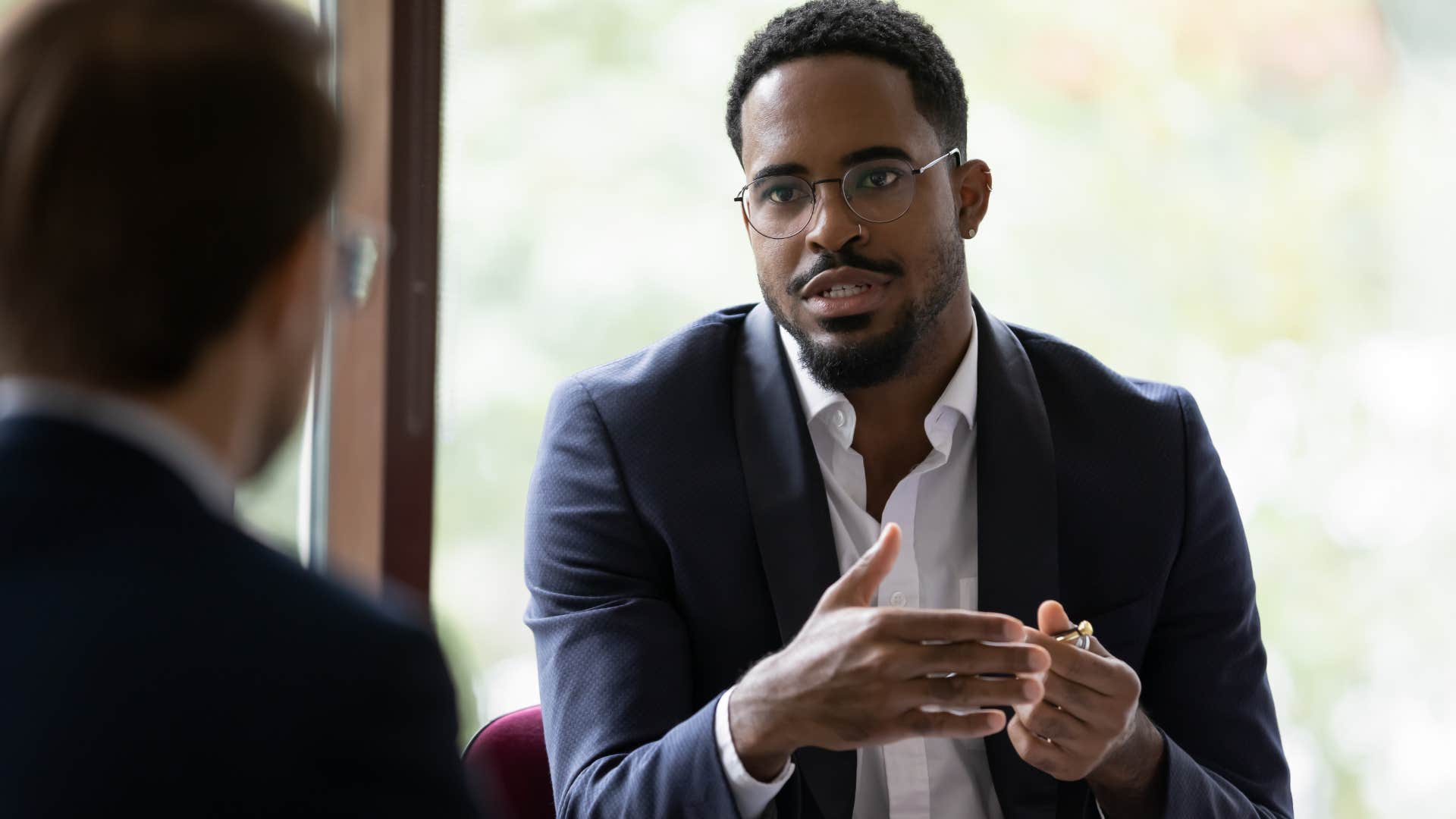 man having a serious conversation with his boss