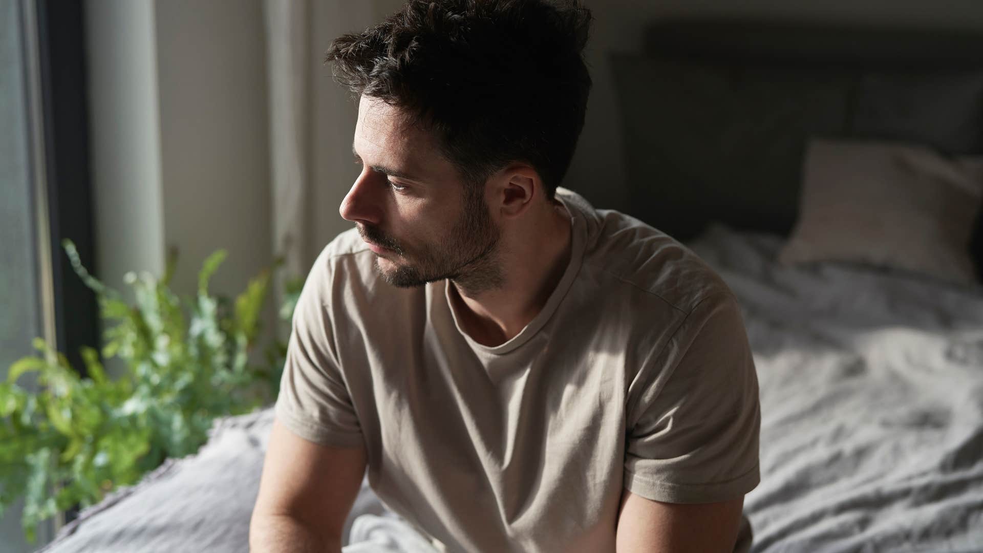 man struggling to relax