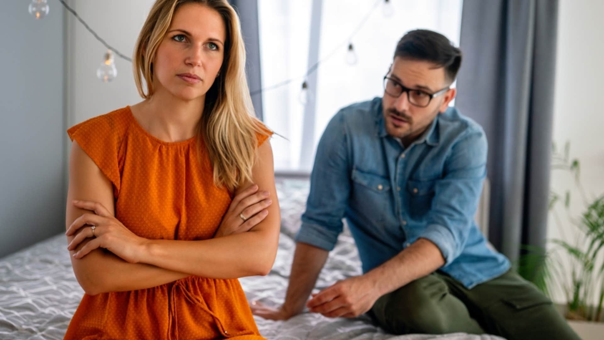 upset woman turned away from partner