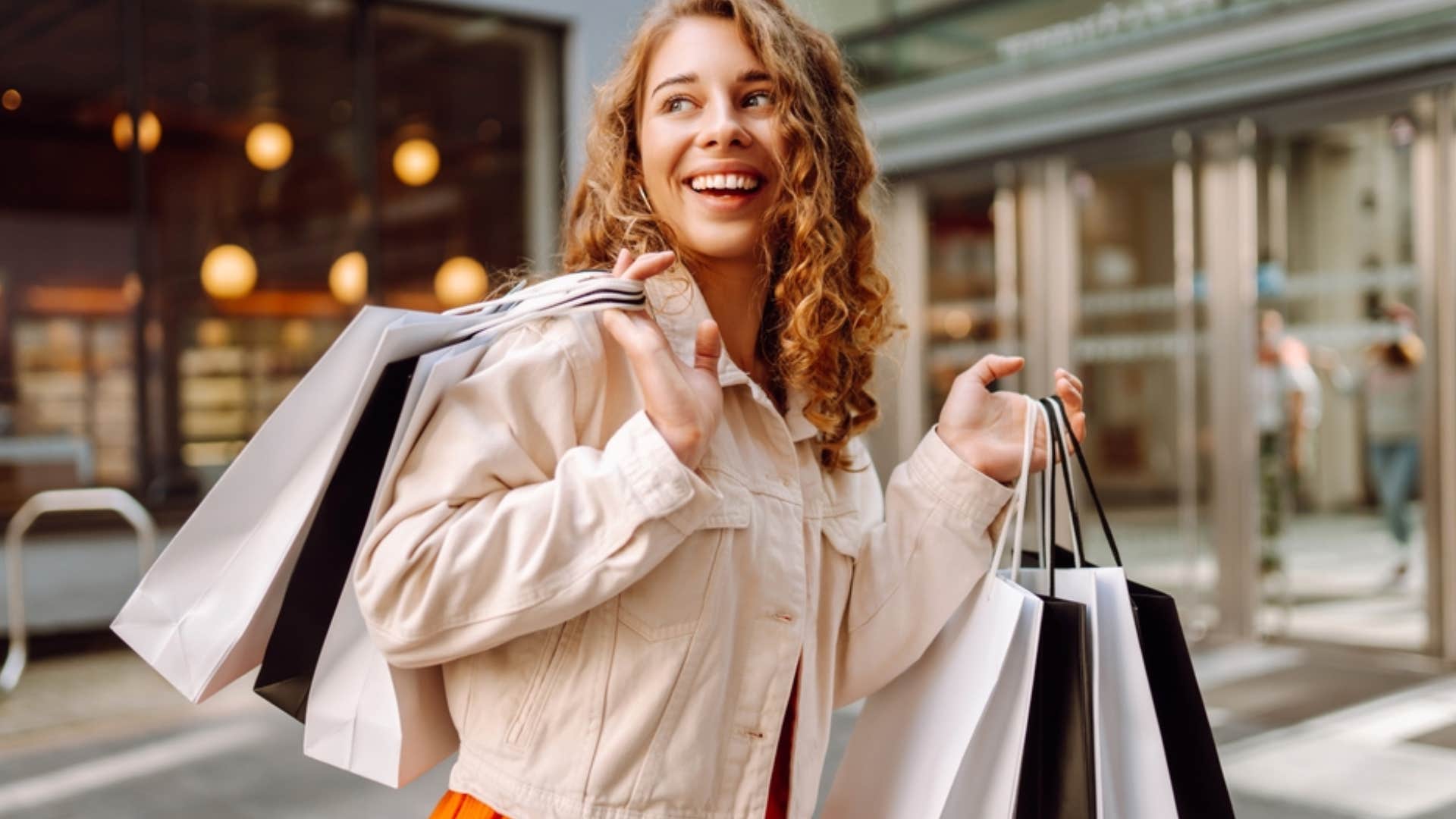 woman after impulsive shopping spree