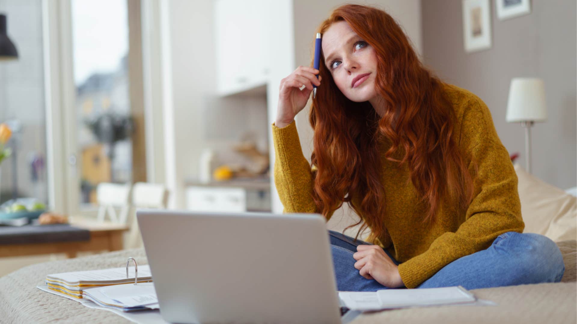woman procrastinating her work
