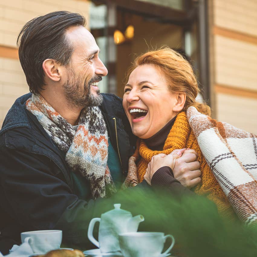 smiling man with smooth behavior winning woman over