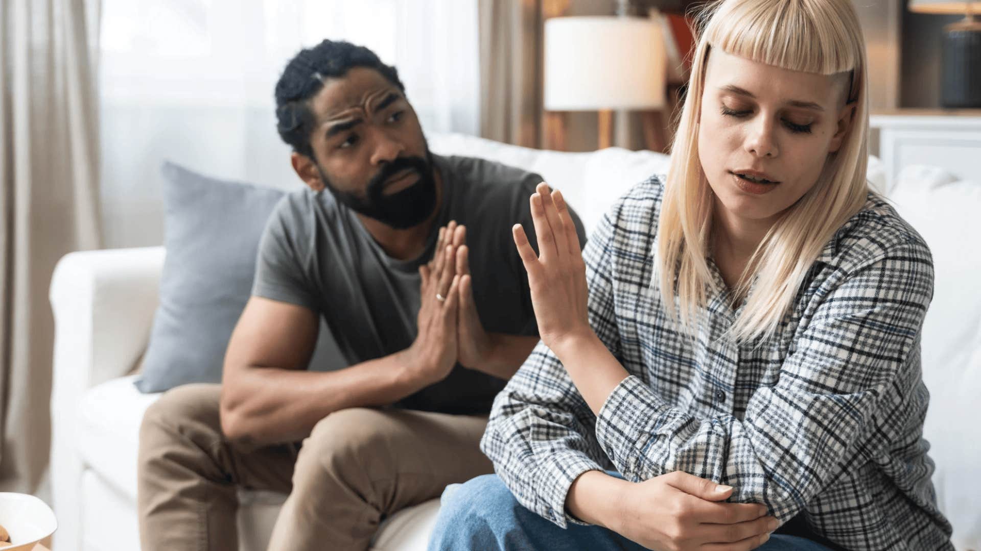 upset couple fighting and falling into sneaky communication traps