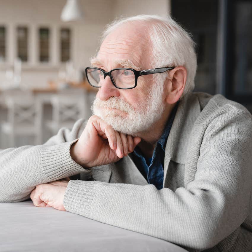 upset alone old man with soul-sucking modern condition