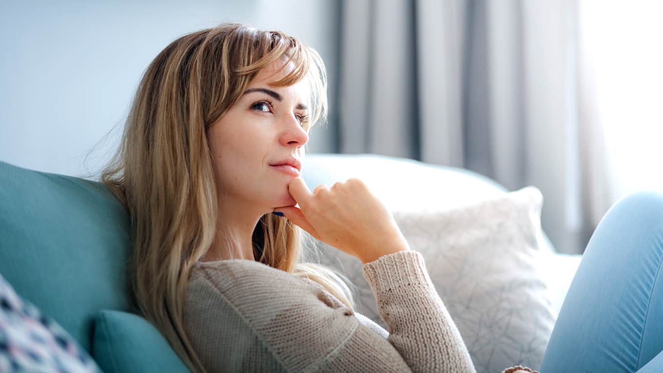 Why Spending Time With Family Is So Emotionally Exhausting Woman thinking about why she feels so emotionally exhausted after spending time with family