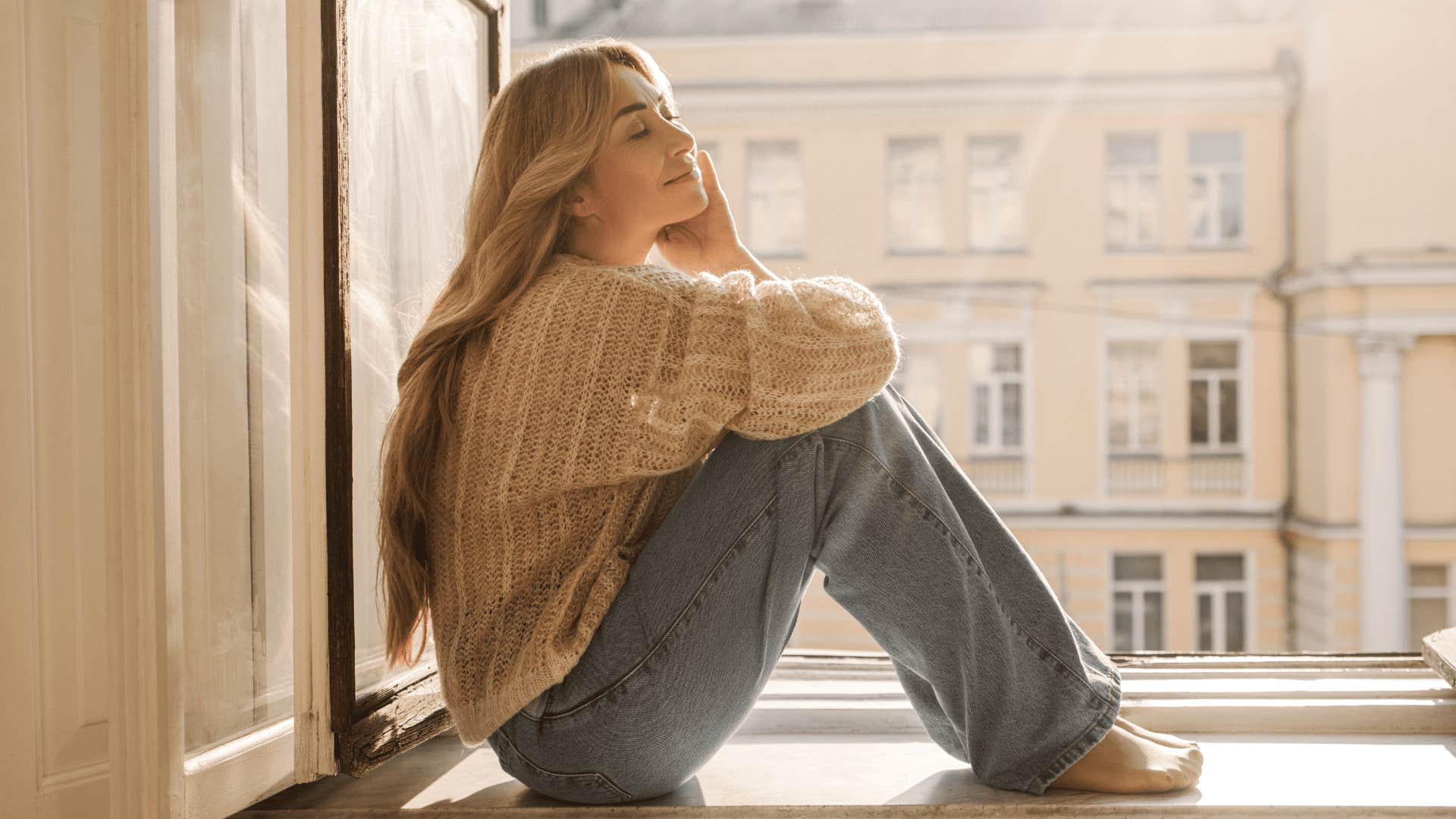 smiling woman who is quietly building a good life